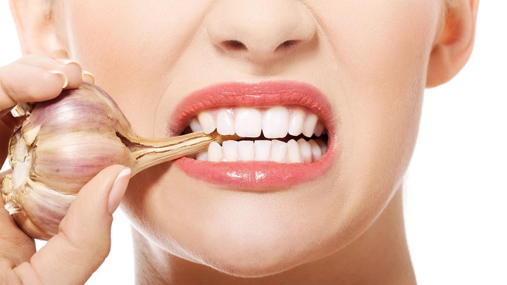 استفاده از سیر و کره بادام زمینی برای عفونت دندان استفاده از سیر و کره بادام زمینی برای عفونت دندان