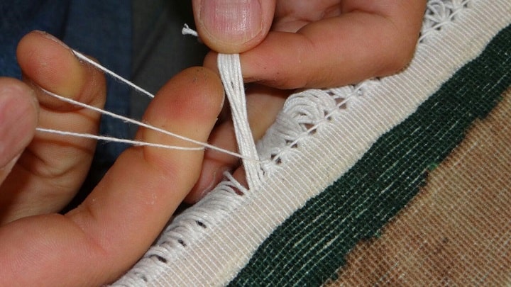 گره زدن ریشه فرش از روش‌های محافظت از ریشه فرش