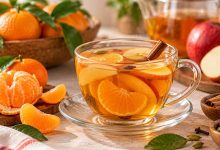 طرز تهیه دمنوش نارنگی و سیب با دارچین و میوه تازه