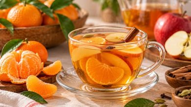 طرز تهیه دمنوش نارنگی و سیب با دارچین و میوه تازه